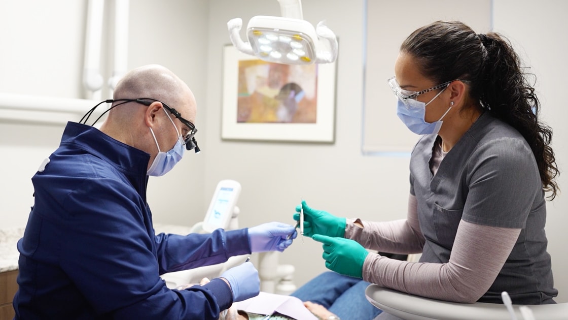 Doctor Working with Patient